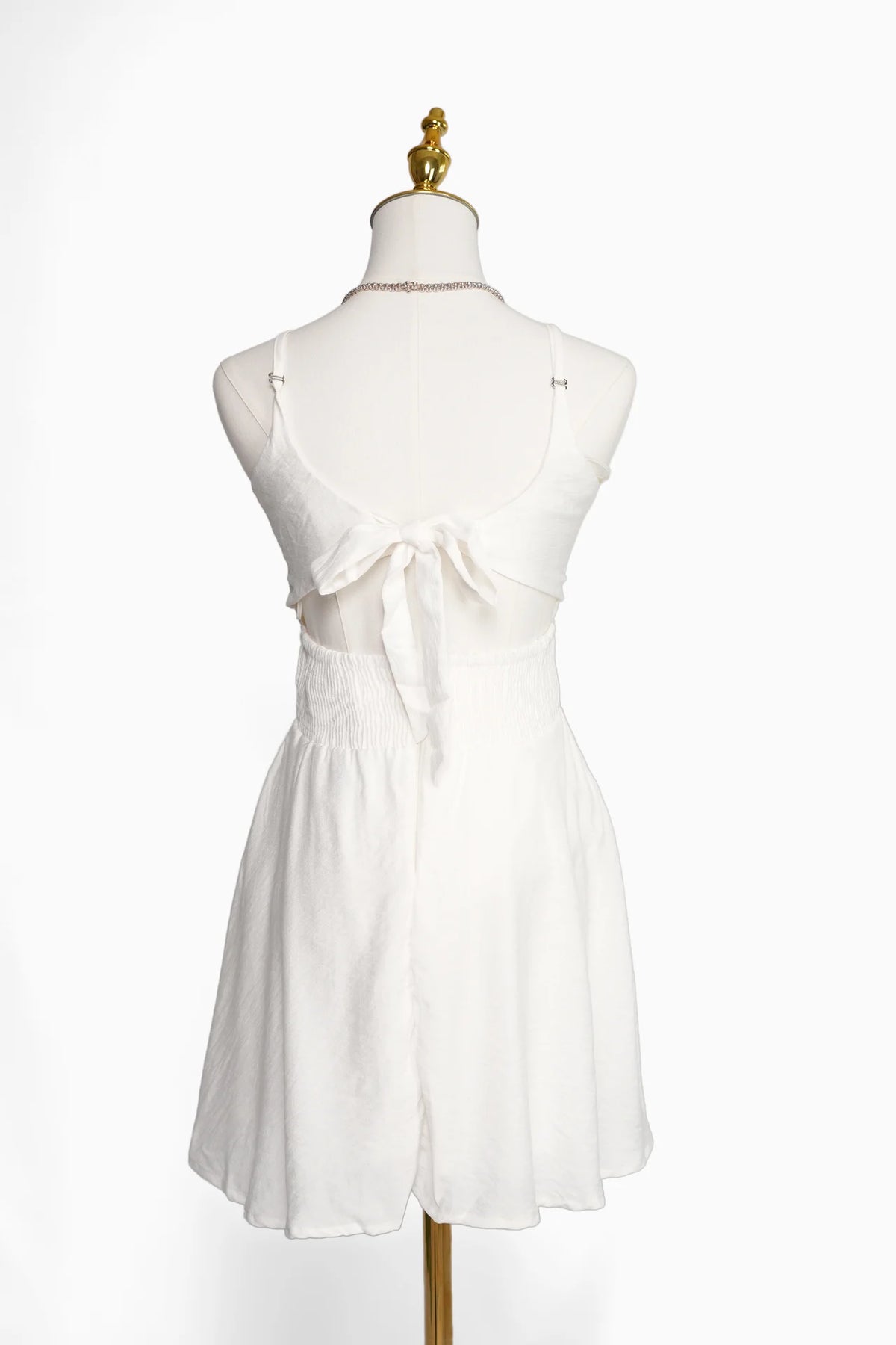 Arioma modelo 26, Blanco. Maniquí · Espalda
